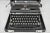 Vintage 1930s Royal De Luxe/Deluxe Touch Control Manual Typewriter with Carrying Case. Circa Early 20th Century....