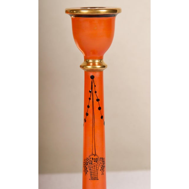 A wonderful pair of Candlesticks, decorated with whimsy in the neoclassic taste, 24K gold and black glass details, and...