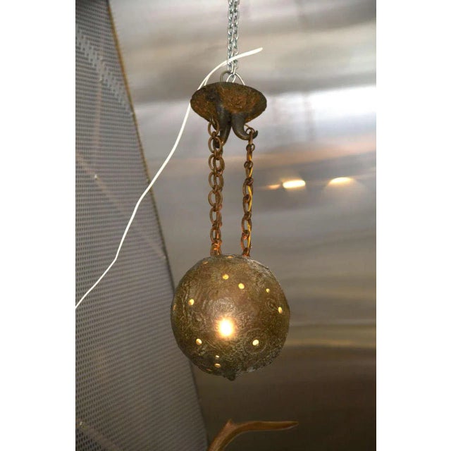 Ths small moon lantern in solid bronze was designed by Robert Phandeve. Up to 250V (Europe/UK Standard).The wiring of this...
