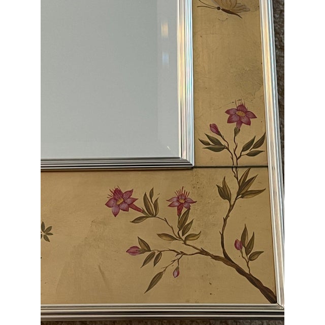 Excellent condition LaBarge, chinoiserie handpainted mirror over gold leaf. The mirror dimensions are approximately 42...
