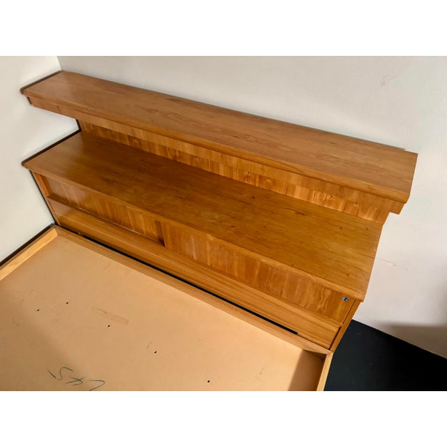 Solid birch queen sized floating platform bed with illuminated, built in headboard storage by Thomasville. Headboard...