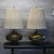 Elevate your home with this exceptional matched pair of authentic Marbro table lamps. This impressive pair features a...