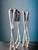 Vintage danish folding stools produced during the 1970s. executed with tubular steel frames and striped fabric seats,...