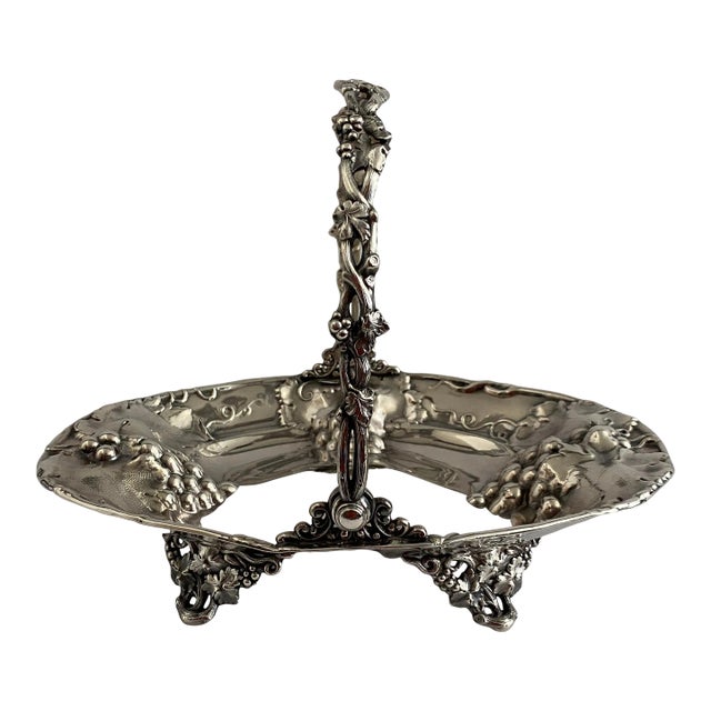 1910s silver plate basket by Homan Manufacturing Company. Impressed grape clusters or bunches in the well and lip of the...