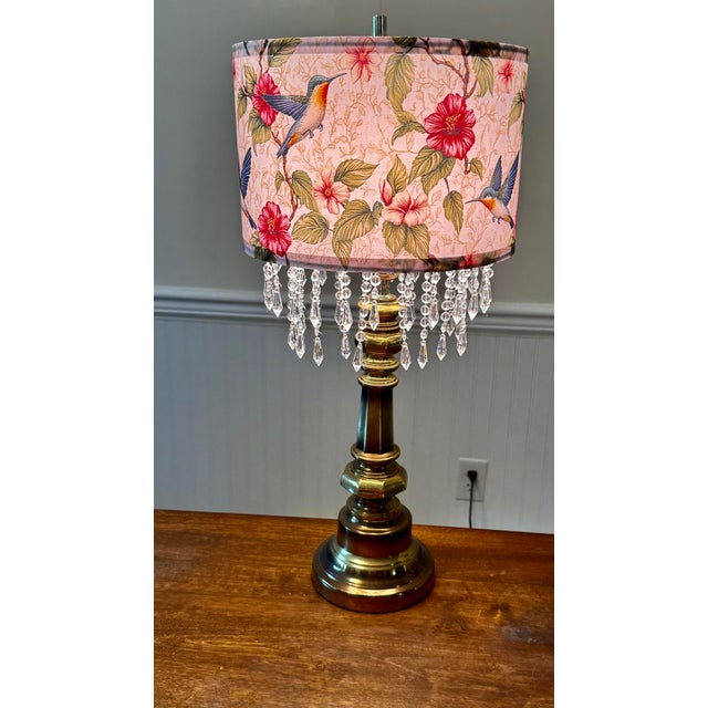 This lamp is a classic, decorative style combining vintage elements with a nature-inspired modern designed shade. It...