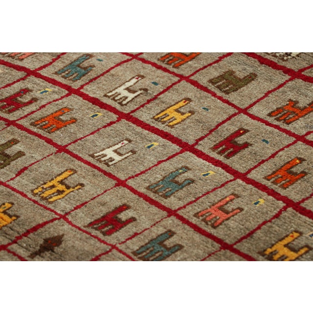 This vintage 3x5 Persian Gabbeh rug is the latest entry to Rug & Kilim’s curation of rare tribal pieces. Hand-knotted in...