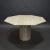 Elegant Italian travertine marble dining table from the 1970s. The table is in very good condition with a few small...