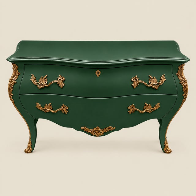 Description: A sculptural Italian bombé chest with a serpentine front, generous proportions, and ornate brass detailing....
