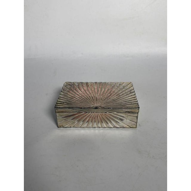 A French decorative box from the 1970s, made of metal, both functional and ornamental. Its balanced and well-proportioned...