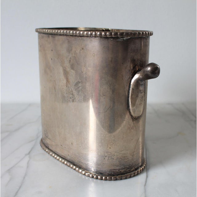 Vintage silver plate double wine holder from Pottery Barn. The holder has a removable divider in the center for use with...