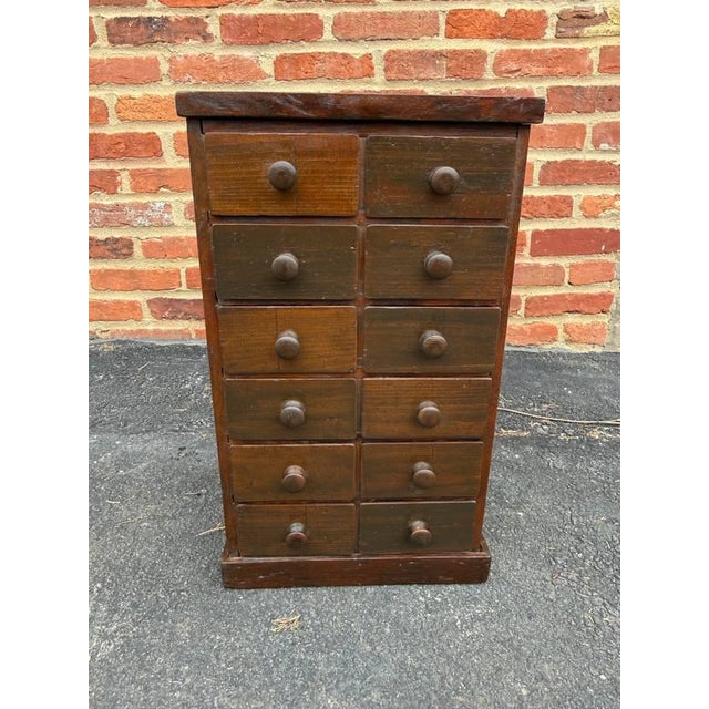 Antique Early American Style Apothecary Cabinet or Spice Drawer Solid wood with wooden knobs, 12 drawers Great condition...