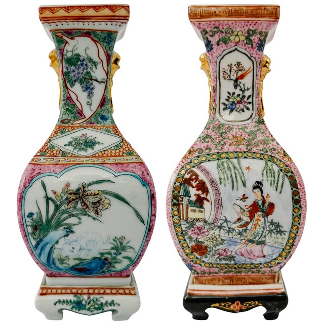 An exquisite pair of vintage Chinese Famille Rose porcelain vases. Sourced from an antique market in Florence, Italy,...
