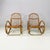 Italian mid-century modern Armchairs with armrests in curved rattan, 1960s Pair of armchairs entirely in curved and woven...