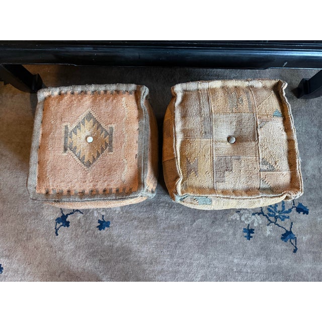 Wonderful pair of vintage Kilim poufs in the style of George Smith. Two distinct modern southwest patterns on each stool,...