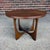 Beautiful vintage Broyhill Brasilia round side table featuring a distinctive sculptural base and stunning radial wood...