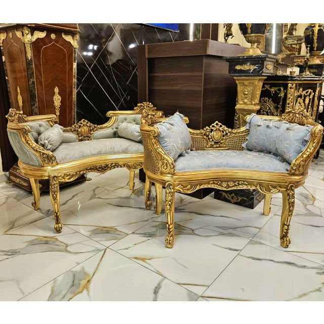 Create a luxurious French-inspired seating arrangement with this matching set of two ornate benches, each featuring an...