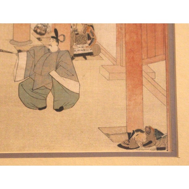 Early 20th century Japanese woodblock print in frame. Unsigned. From a series depicting the night attack and flight of...