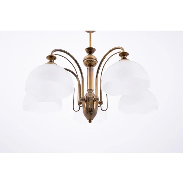 Brass Chandelier, Poland, 1980s, in Flawless conditions. Designed 1980 to 1989 Up to 250V (Europe/UK Standard).The wiring...