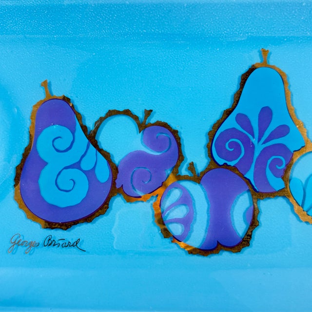 From the designer Georges Briard, and from the Pageant Fruit collection, a Peacock Blue glass serving tray with a...