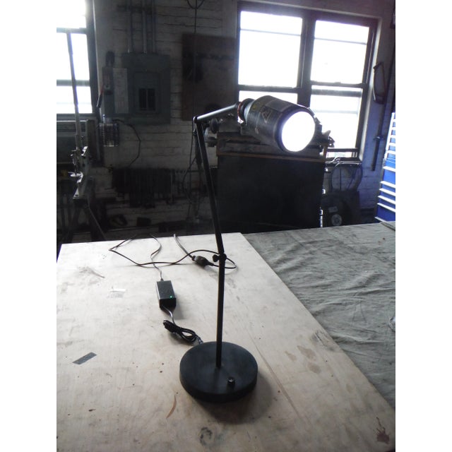 This mixed metal desk lamp is assembled from steel and brass. It has an aluminum vending machine coffee can shade the...