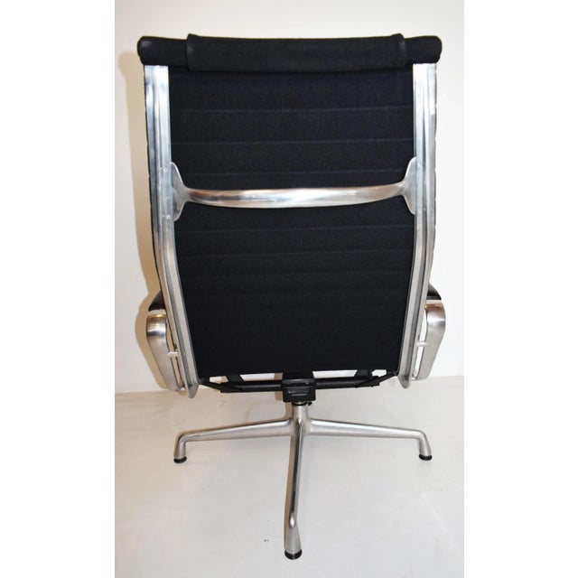 - alluminium group swivel chair with footrest - designed by charles & ray eames for vitra - produced in norway in the 50s...