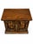 A distinctive vintage two-drawer nightstand or end table dating approximately to the 1970s. The piece features a richly...