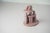 “Domestic Daydream” (light pink rain) Low fire clay, under glaze, glaze. 6 x 5 1⁄4 x 4 3⁄8 in 2024 Aaron Becker’s (He/Him)...