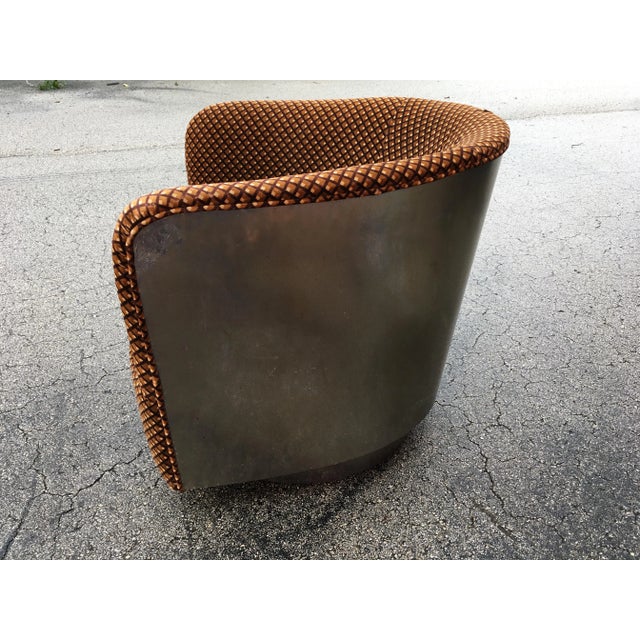 Take iconic mid-century American furniture for a spin with this classic tub chair from design legend Milo Baughman for...