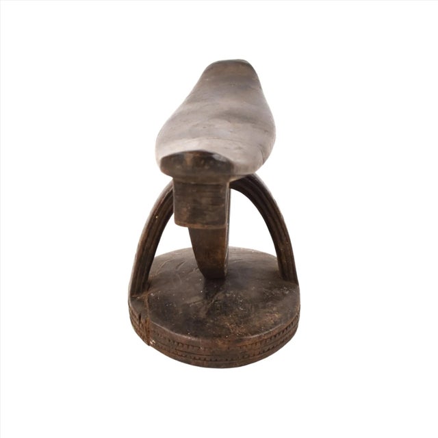 Unique balancing headrest design! The Shona wood headrest was hand-carved by the Shona people of Zimbabwe. Headrests such...