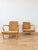A stunning and rare pair of vintage lounge chairs that perfectly embodies the minimalist, organic, and brutalist aesthetic...