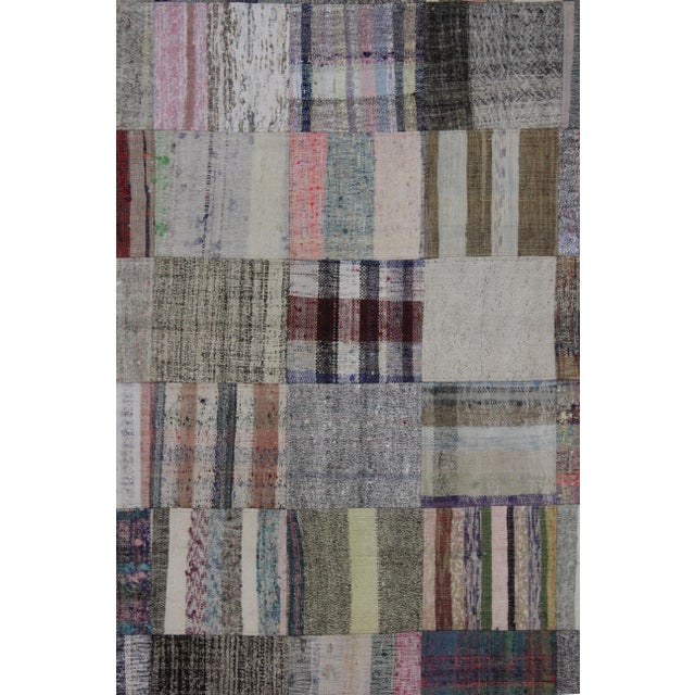 A beautiful Vintage Patchwork rug . It's in very good condition, practically new. This Patchwork rug is produced of older...