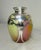 The Antique Hand Blown Loetz Candia Silberiris Sterling Silver Overlay Glass Vase is a stunning piece of art glass...