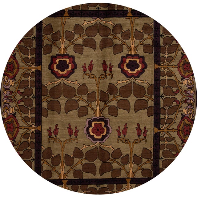 A beautiful Modern Tibetan rug, hand-knotted wool with an olive field, and multi-color accents in all-over floral design....