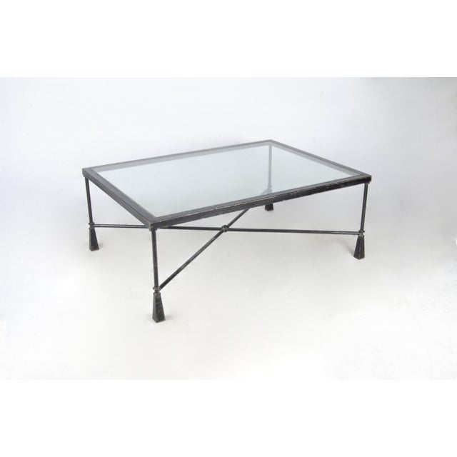 Early 20th century French Expressionist rectangular iron coffee table with glass top in the manner of the Giacometti...