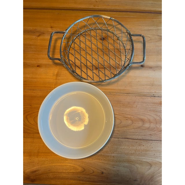 A beautiful addition to your dining table. Bake directly in the round stoneware dish and set at the table in the true...