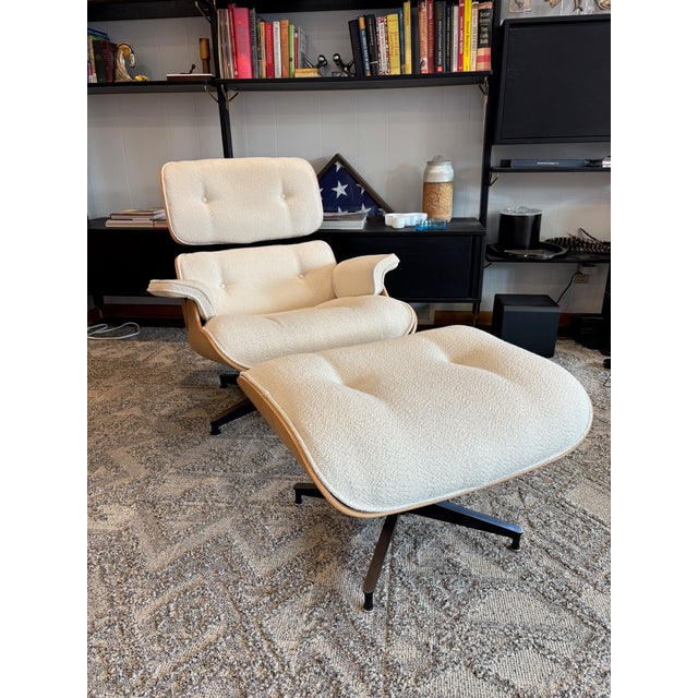 Iconic Eames Lounge Chair and Ottoman was originally released in 1956, The chair is sized "Tall" with White Oak shell and...