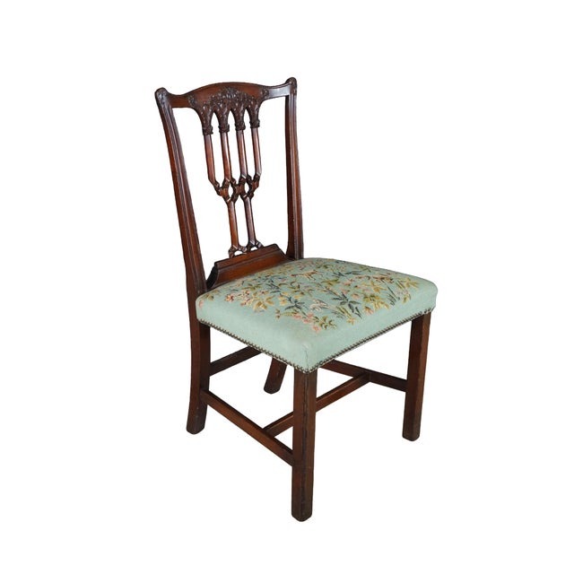 19th Century Chippendale style mahogany side chair beautifully highlighting the intricate architectural charm of the...