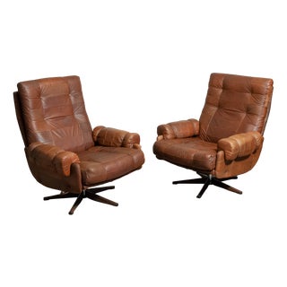 Rocking and Swivel Lounge Chairs attributed to Arne Norell for Arne Norell AB, Sweden, 1960s, Set of 2 For Sale