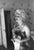 Marilyn Getting Ready To Go Out NEW YORK - MARCH 24: Actress Marilyn Monroe gets ready to go see the play "Cat On A Hot...