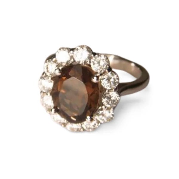 14K white gold ring featuring a natural 2 carat smokey quartz center stone, surrounded by brilliant round diamonds...
