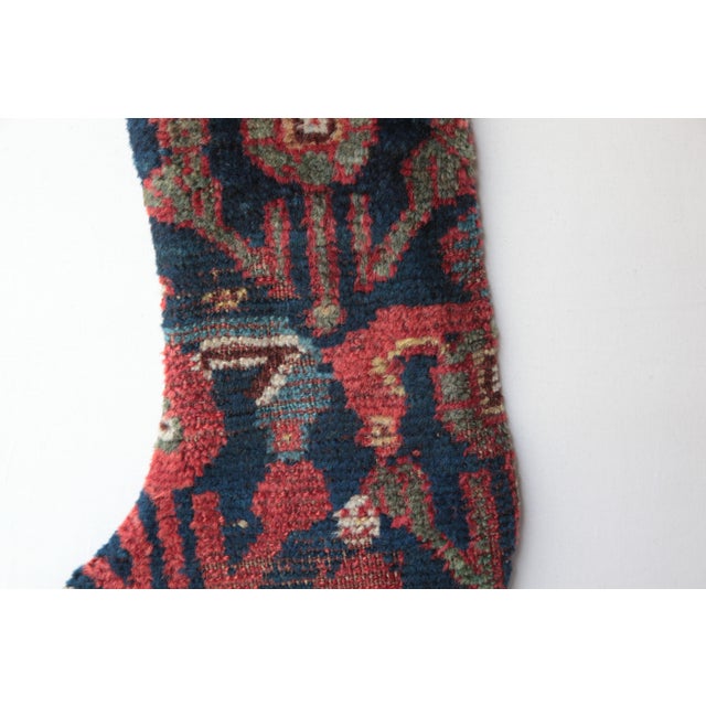 Mid 20th Century Handmade Holiday Stocking From Antique Tribal Rug – Festive Elegance With Cultural Soul For Sale - Image 5 of 6