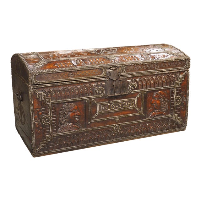 A Fascinating 17th Century Carved and Iron Studded French Trunk, Dated 1632 For Sale
