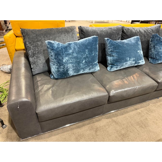 A striking blend of contemporary design and luxurious comfort, the Nathan Anthony “Wilshire” Sectional makes a bold...