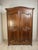 Handcrafted from solid French oak around 1900, this handsome French Provincial armoire embodies the timeless craftsmanship...