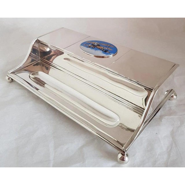 A fine george v sterling silver ink stand or standish, hallmarked london 1911 and made by c. F. Hancock & co.,...