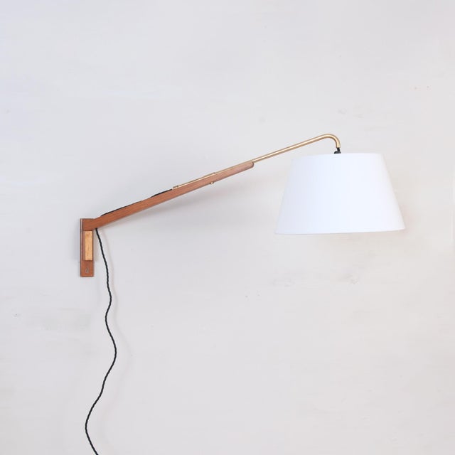 Telescopic Wall Lamp, 1950s, in Very Good conditions. Designed 1950 to 1959 UK Plug (up to 250V).The wiring of this item...