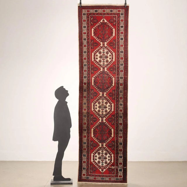 Asian rug in cotton and wool; big knot. Manual manufacturing. This piece is attributed to the mentioned designer/maker. It...