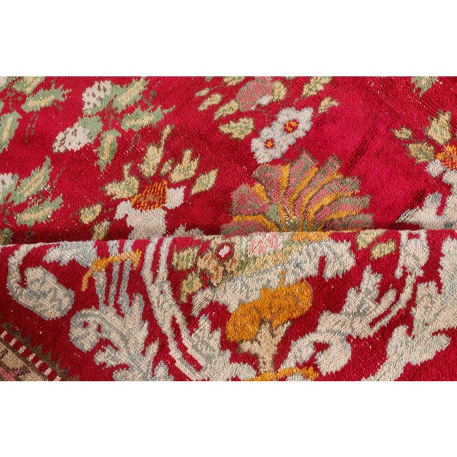 A vivid and classically elegant antique Turkish Ghiordes carpet dating to circa 1880. This exceptional rug boasts a...