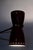 French adjustable wall lamp from the 1950s, attributed to Robert Mathieu (1921–2002). Made of red lacquered metal and...