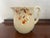 Charming vintage Hall China pitcher or large creamer in the classic Jewel Tea Autumn Leaf pattern. The vertically ribbed...